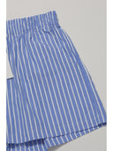 detailed shot of blue shorts with white stripes by one dna brand